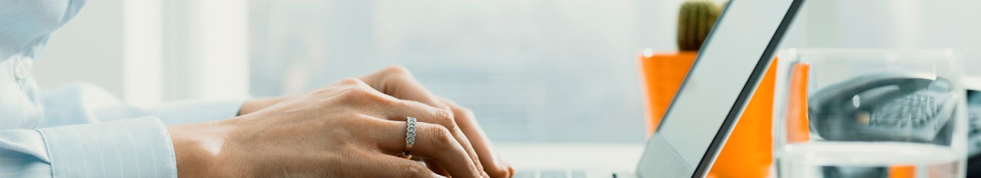Fingers typing on keyboard