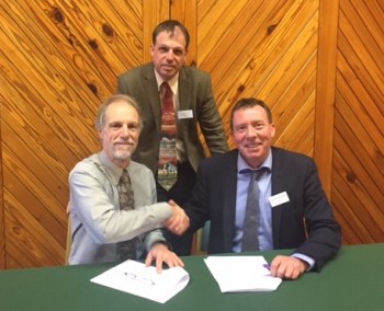 Peter Hinton and Michael MacDonagh sign the MoU